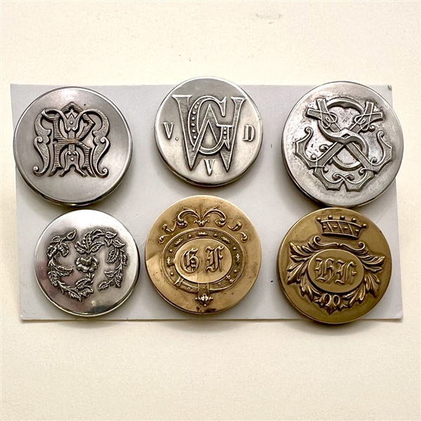 Six Livery and other monogram buttons.