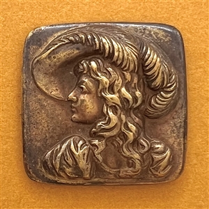 Brass button of Lillian Russell.