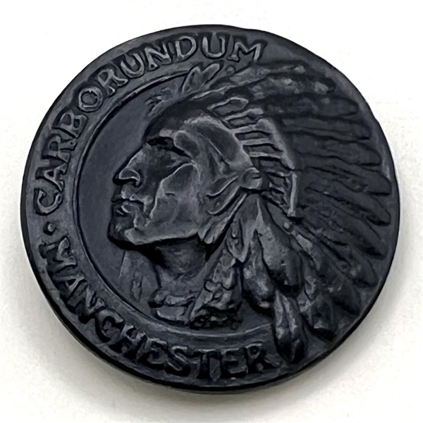 Native American button with verbal border.