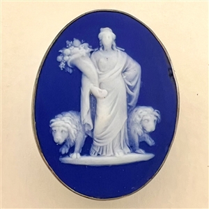 Oval Wedgwood button of a goddess holding a cornucopia.