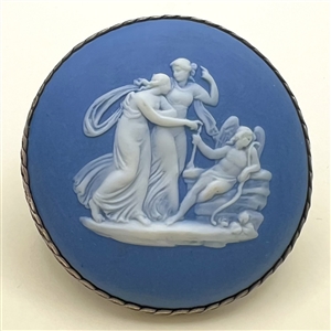 Extra large Wedgwood of cupid interacting with a couple button.