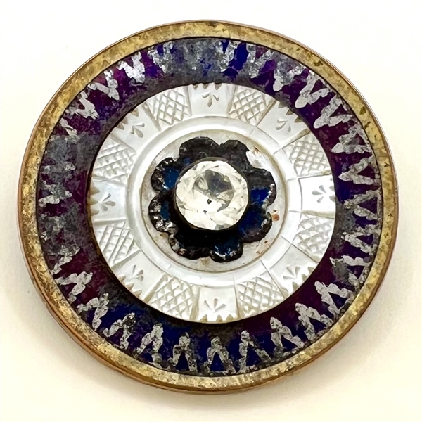 An 18th c. button of tinted steel with pearl, tinted steel flower and paste center.