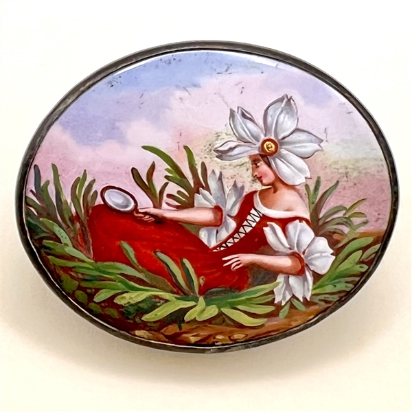 Garden fairy with mirror button set in white metal. 