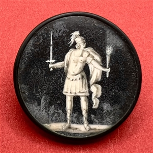 An 18th c. painting on natural material under glass set in metal button of warrior.