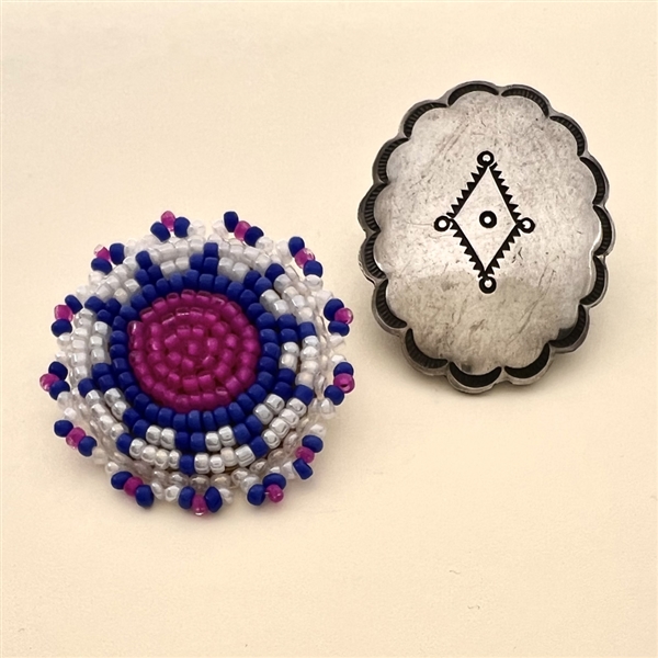 Two Native American buttons, beaded and silver.