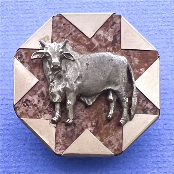 Faux handkerchief corner studio button of a cow by Phil Linley.