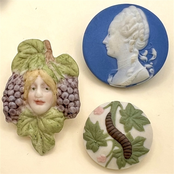 Three assorted Jasperware studio buttons.