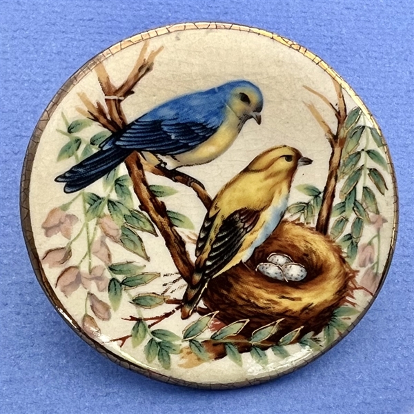 Huge ceramic button of birds by Shirley.