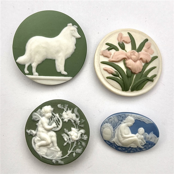 Four Jasperware studio buttons by Shaw and Rzanski .