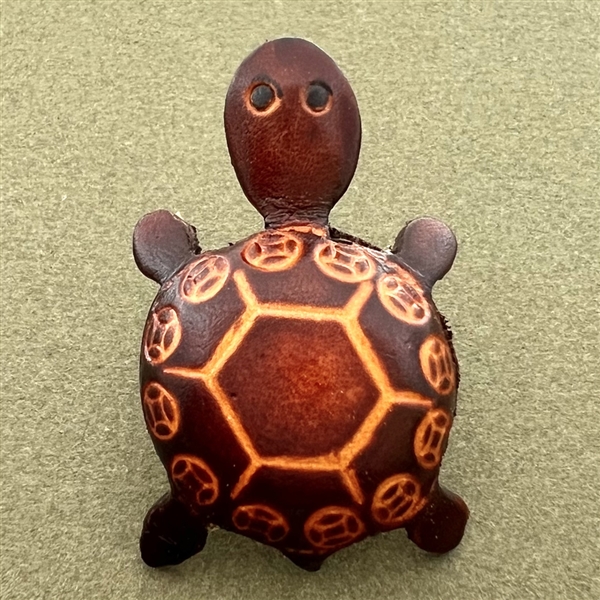 Leather realistic turtle button.