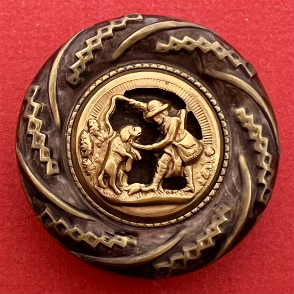 Four shell sporting buttons with escutcheons.