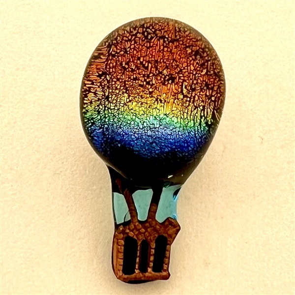 Mary Gaumond’s iridescent hot air balloon studio glass button.