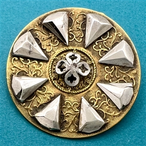 A 19th c. Stunning stamped brass button with steels.