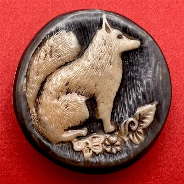 Hallmarked silver button of people with dogs.