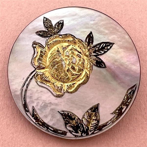 Pearl button with gold rose.