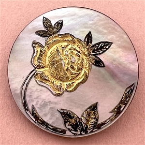 Pearl button with gold rose.