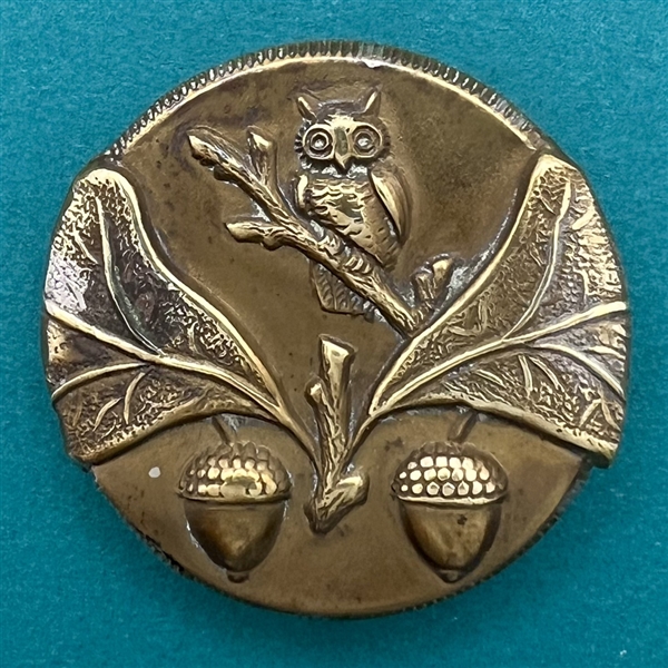 Unusual brass button of an owl with acorns.