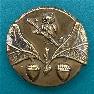 Unusual brass button of an owl with acorns.