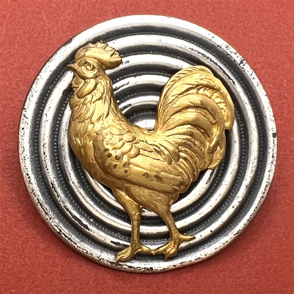 HUGE button of a rooster.