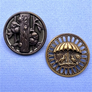 Two brass buttons of birds.