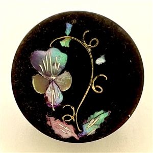 Horn inlay button of a violet.