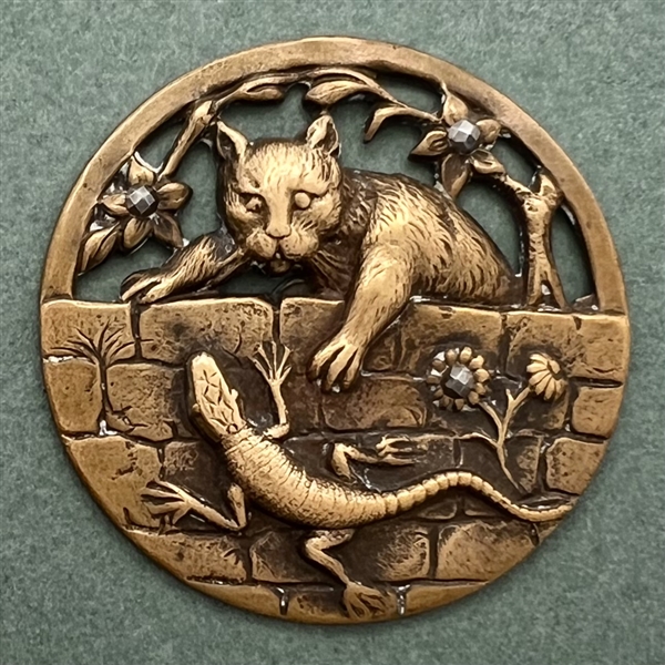 “Kitty and Lizard” brass button.