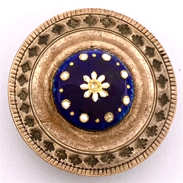 An 18th c. Copper button with enameled plaque center.