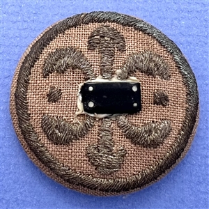 An 18th c. Transitional passementerie fabric button.