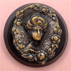 “Gibson Girl”  brass over synthetic polymer coat button.