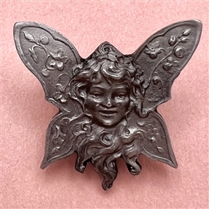 Battersea pewter “fairy girl” Art Nouveau style button.