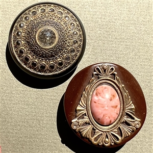 Two Vintage plastic coat buttons with brass and faux gemstones.