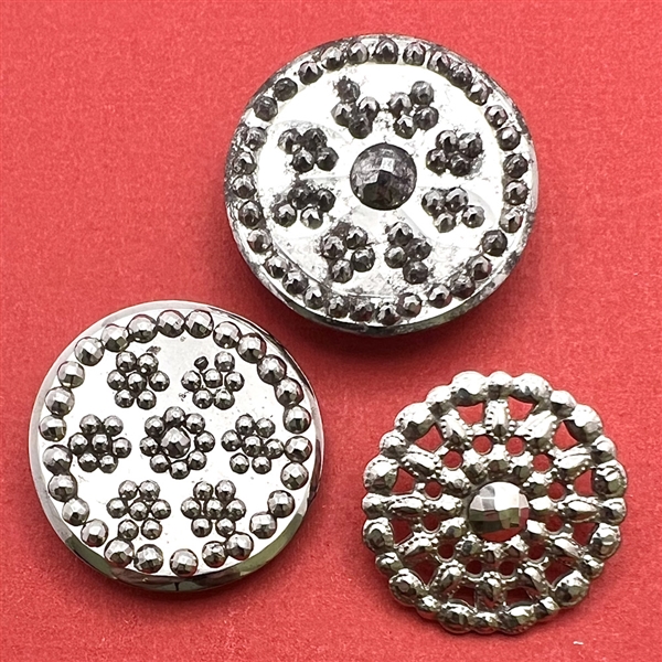 Three steel buttons, two are 18th c.