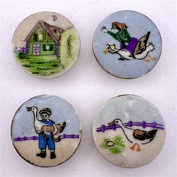 “Goose that laid the golden egg” four button set by Lois Calkins.