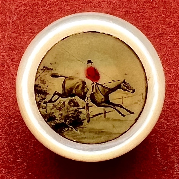 Pearl vest button lithograph of equestrian horse jumping. 