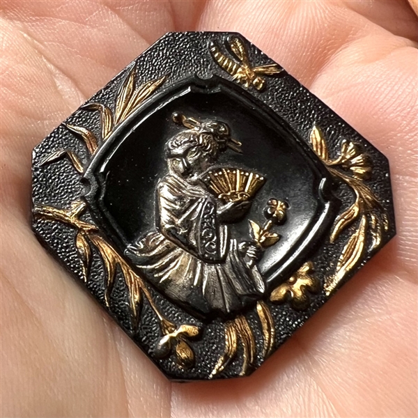 Black glass button of Madame Chrysanthemum 