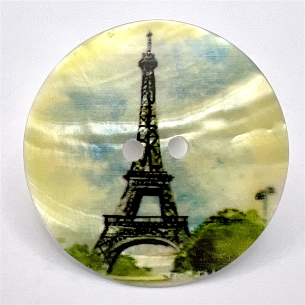 Transfer on iridescent shell button of Eiffel Tower.