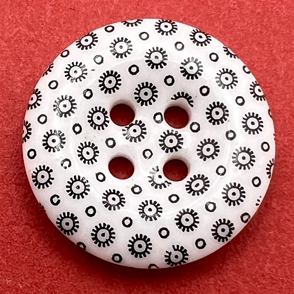 Medium calico button.