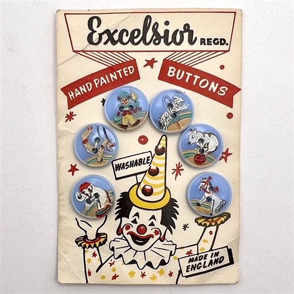 Card of six hand painted Vintage plastic circus buttons.