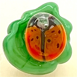 Mary Gaumond’s DIMINUTIVE lady bug studio glass button.