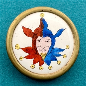 Enamel button of a jester. 