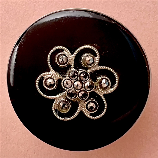 Black glass in metal button with facetted marcasites. 