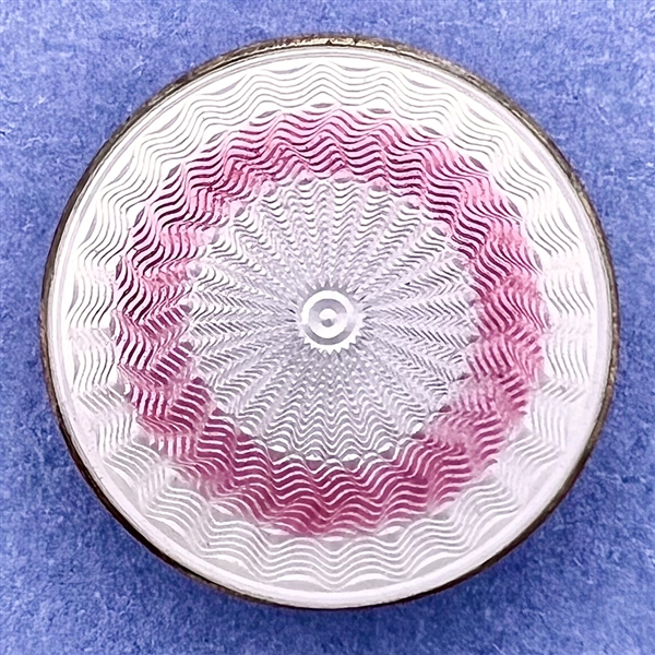 Basse-taille enamel on silver button.