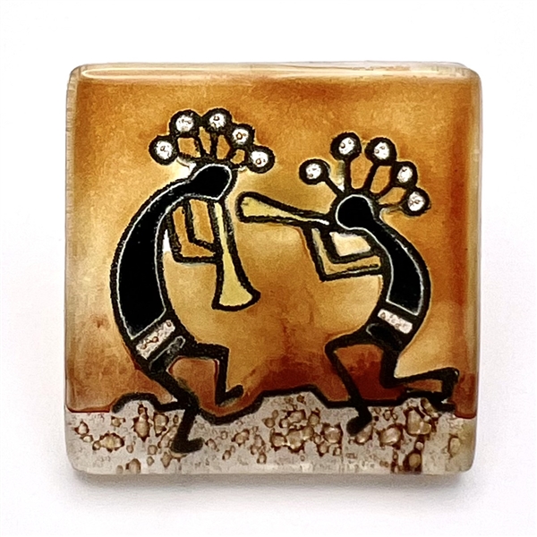 Fused glass Kokopelli button.