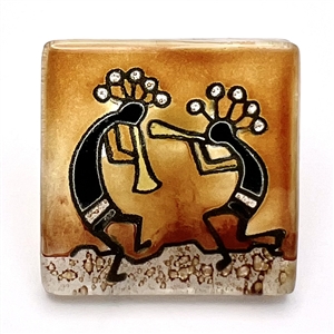 Fused glass Kokopelli button.