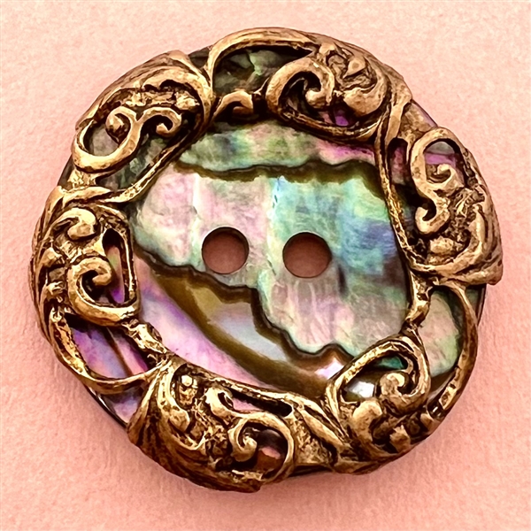 Abalone with stamped brass border.