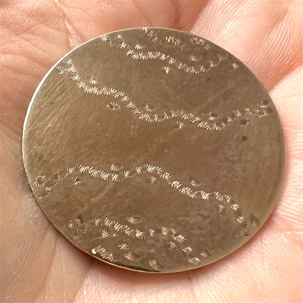 An unusual 18th c. Chased copper Colonial button of wavy pattern.