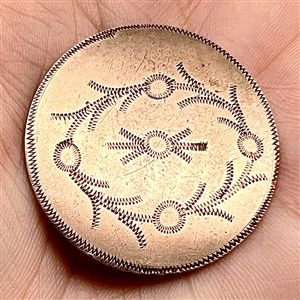 An 18th c. chased copper Colonial button of interesting pattern.