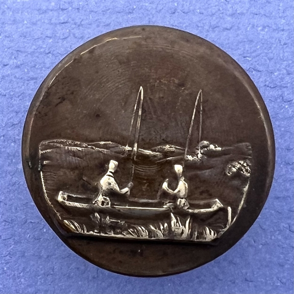 French sporting button of men fly fishing.