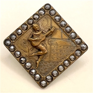 Brass button of “Mephisto Serenading.”