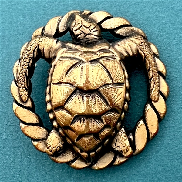 Brass sea turtle button by Sam Biern.